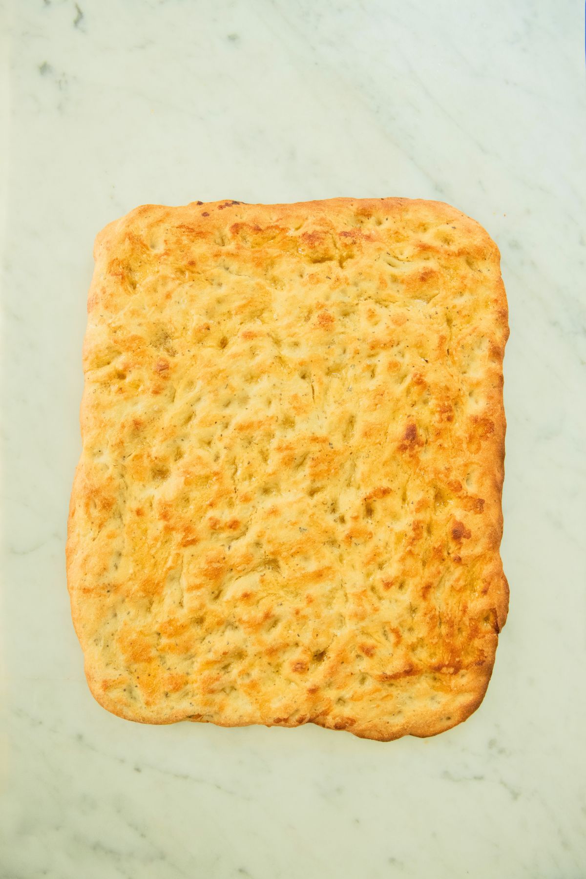 Baked basil focaccia bread.
