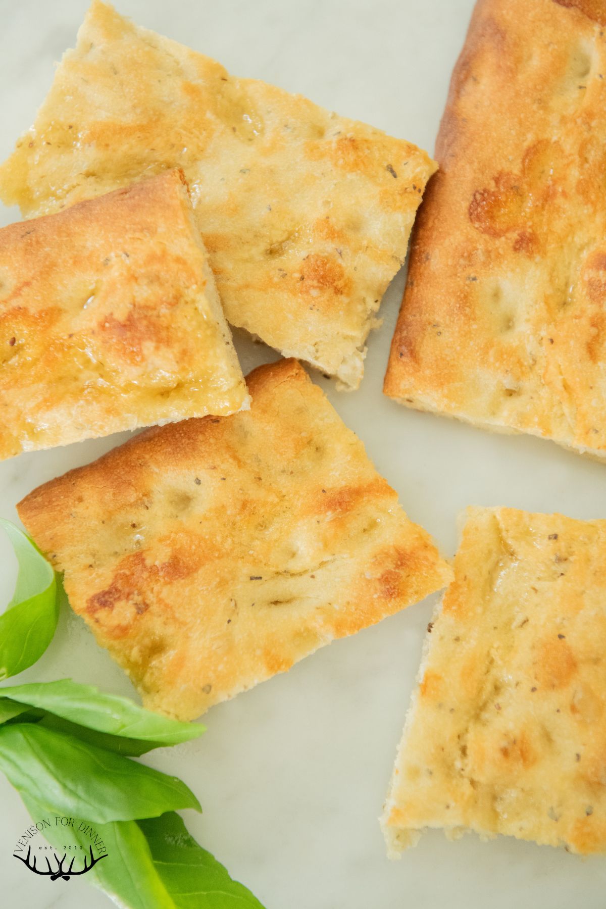Slices of homemade basil focaccia.