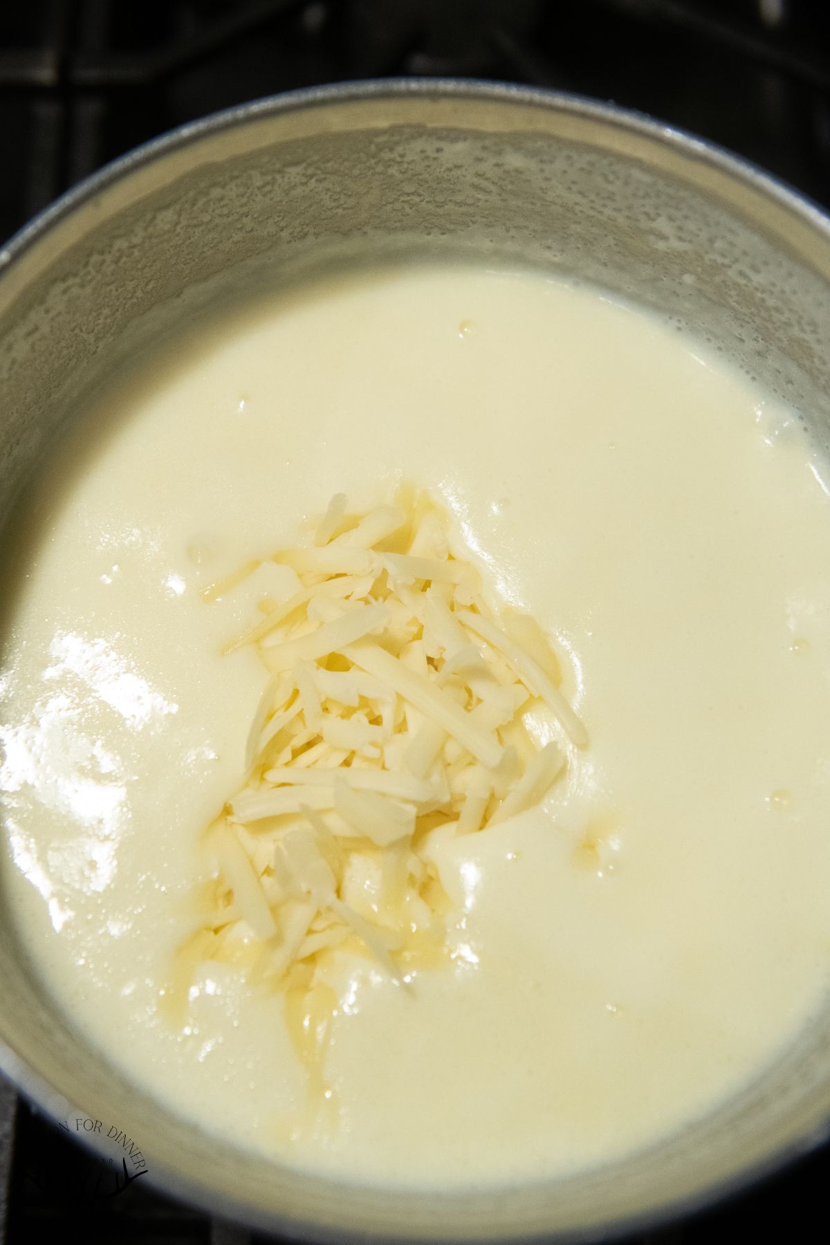 Cheese melting into sauce.