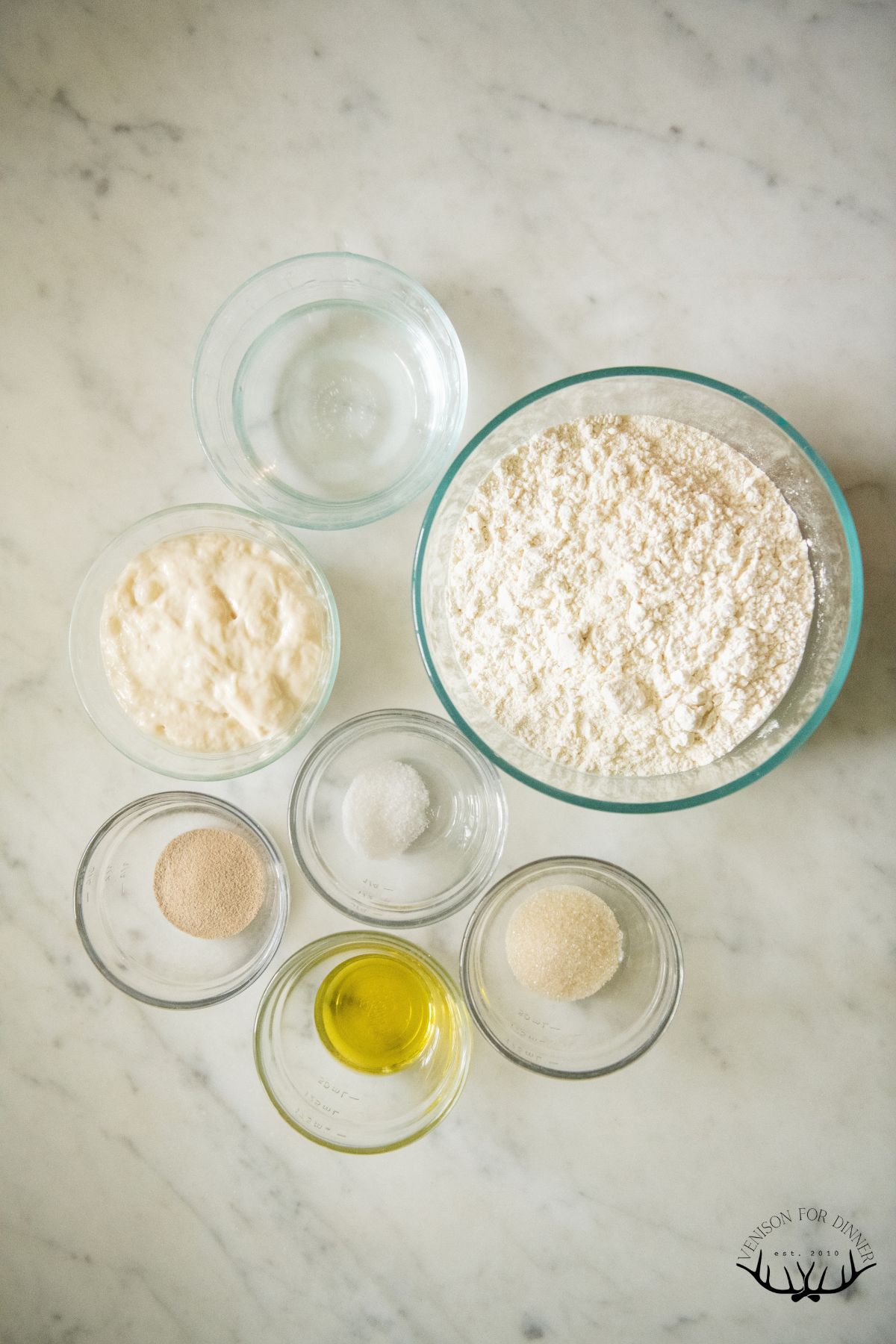 Ingredients to make sourdough discard pizza dough.