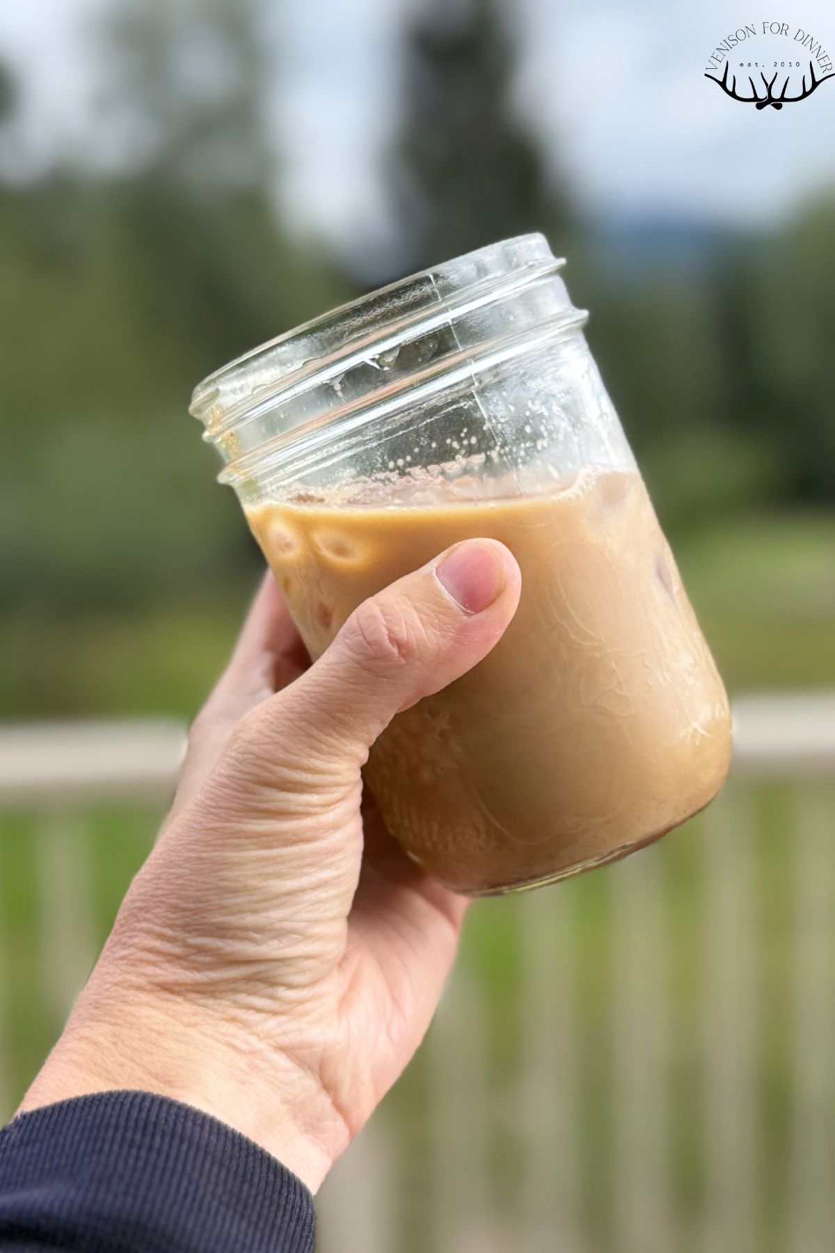 Pumpkin spiced iced latte in a jar.