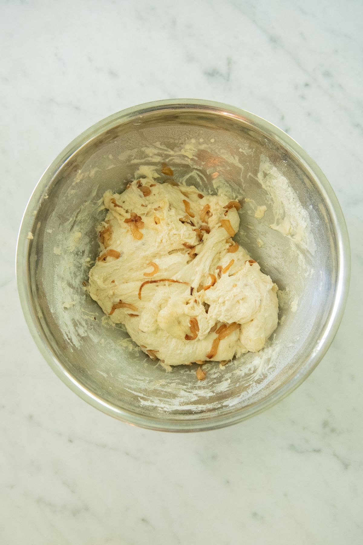 Onions kneaded into bread dough.