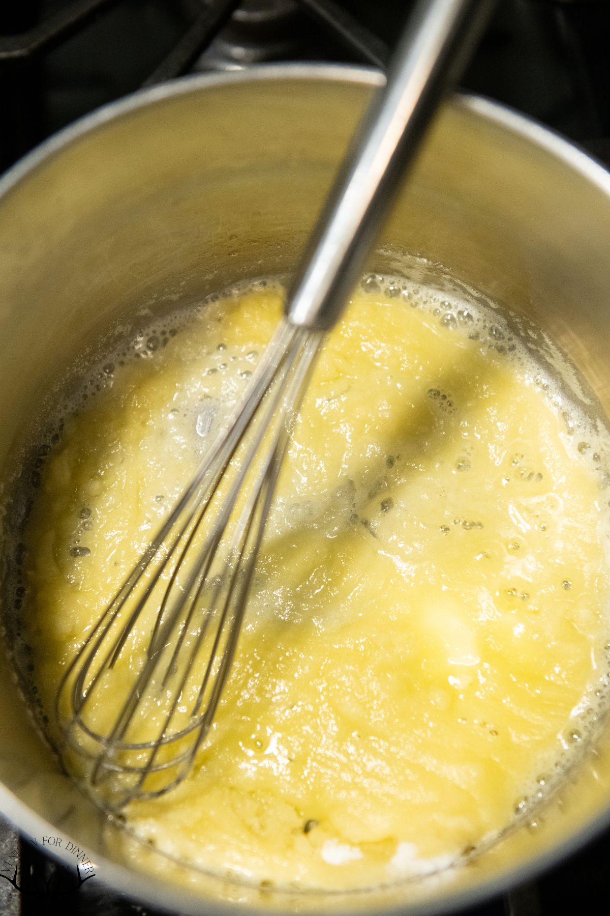 Whisk in butter and flour.