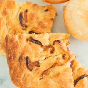 Squares of onion focaccia bread.