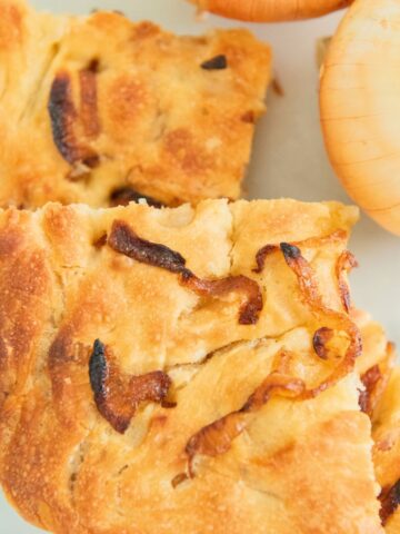 Squares of onion focaccia bread.