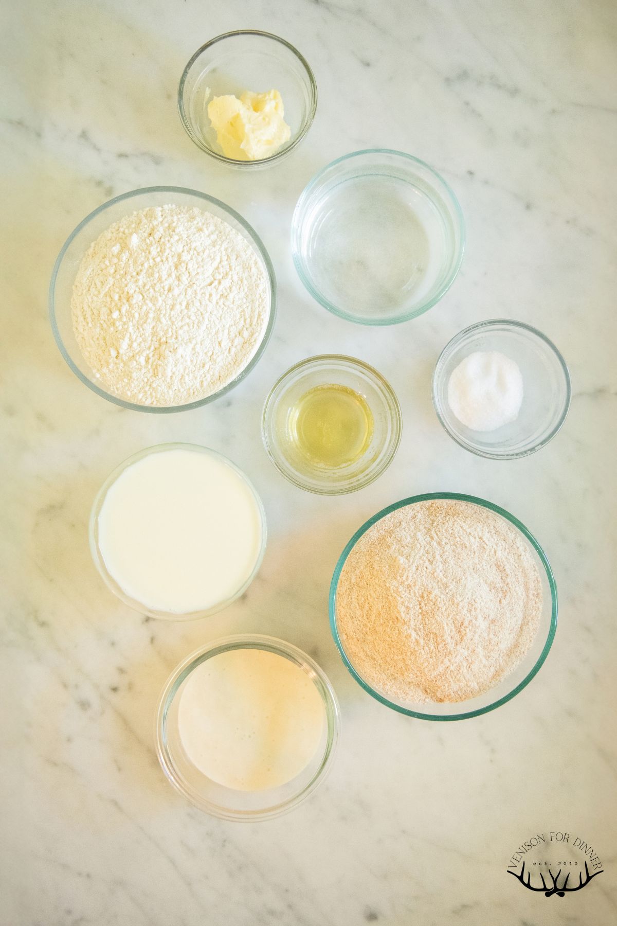 Ingredients to make whole grain sourdough bread.