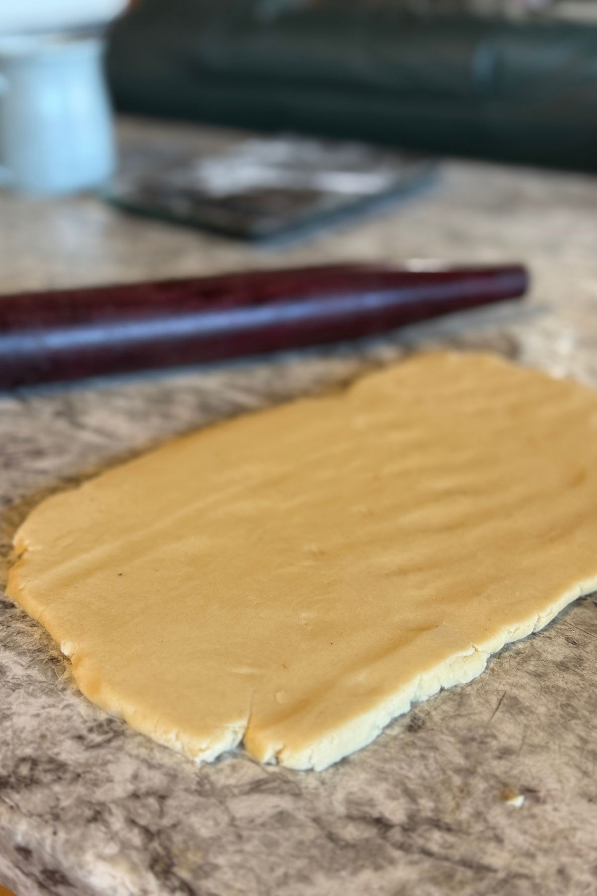 Shortbread dough in a rectangle.