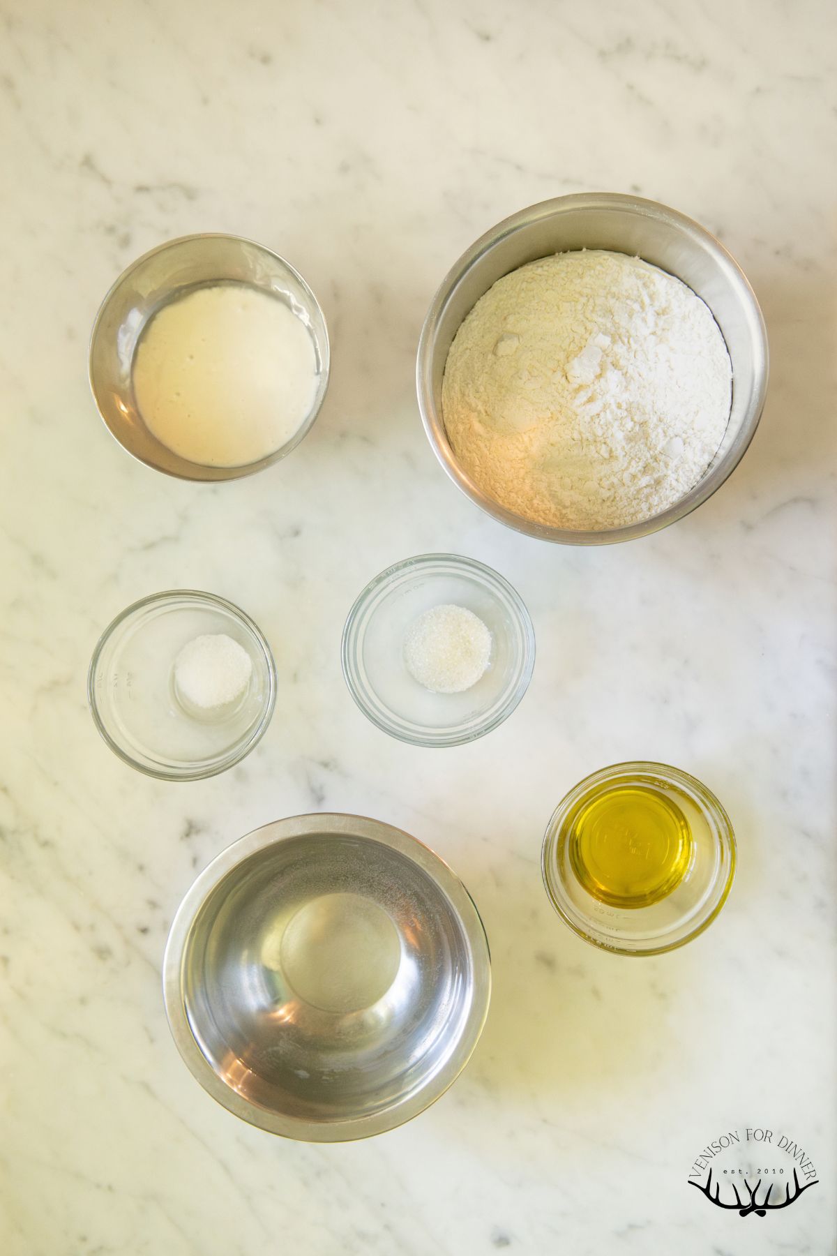 Ingredients for no knead sourdough baguette.